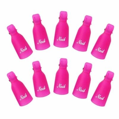 Bright pink nail polish bottles with