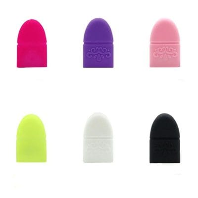 Brightly colored silicone makeup sponges in pink, purple, yellow, white, pink, and black designed for smooth and even cosmetic application. Perfect for professional and personal beauty routines.