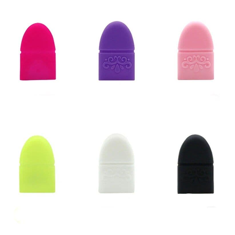 Brightly colored silicone makeup sponges in pink, purple, yellow, white, pink, and black designed for smooth and even cosmetic application. Perfect for professional and personal beauty routines.