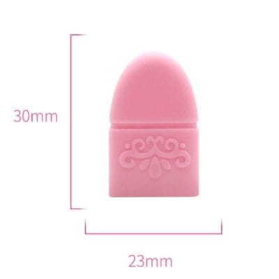 Soft pink beauty blender for skincare and makeup application, measuring 30mm by 23mm, with elegant embossed design for precise blending.