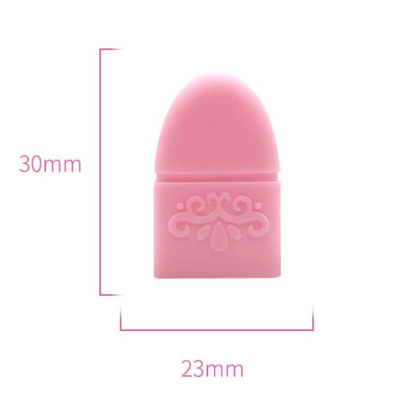 Soft pink beauty blender for skincare and makeup application, measuring 30mm by 23mm, with elegant embossed design for precise blending.
