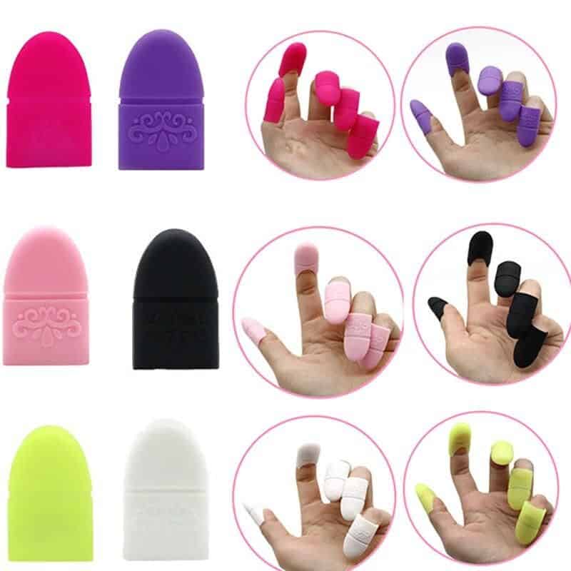 Versatile silicone finger covers for nail art, manicures, and beauty treatments. Available in pink, purple, black, white, and neon colors, these finger caps protect and enhance nail work.