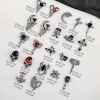 Enhance your nail art collection with these fashionable nail charms featuring silver, black, and red designs. Suitable for creating eye-catching nail decorations, suitable for professional salons or at-home manicures.