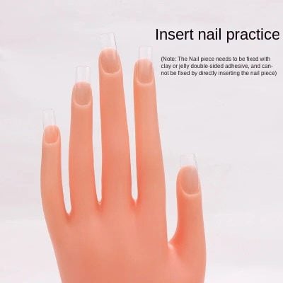 Detailed image of a practice nail hand used for beauty and nail art training. Features natural-looking nails with proper extension and grooming, ideal for nail technician practice.