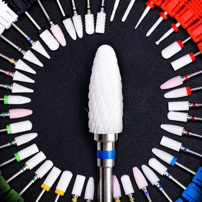 Precision nail drill bits for professional manicures and pedicures. High-quality, durable, ideal for shaping, filing, and buffing nails with ease. Perfect for salon and personal use.