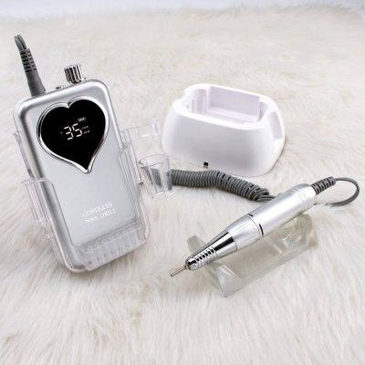 Portable cordless nail drill for manicures/pedicures, professional or home use, featuring adjustable speed, LED display, and lightweight design for precision nail art and enhancement.