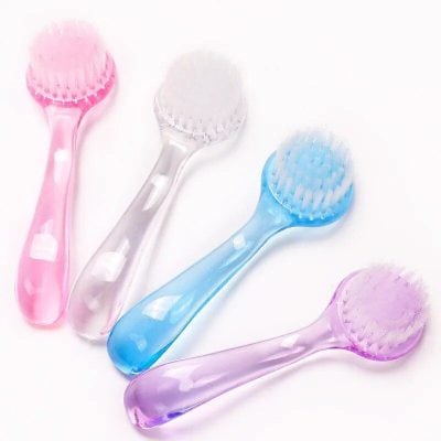 Soft silicone toothbrush for oral hygiene, ideal for sensitive gums and kids, in pink, white, blue, purple, and lavender colors, perfect for daily dental care at Monalisa Store.