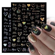 Elegant black nail design with holographic 'Just Love' and heart decals, accented by a glittery gold and clear nail. Perfect for expressing love and stylish fashion.