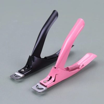 Modern black and pink stapler for efficient document binding at medical or office settings. Durable metal parts and ergonomic design for smooth stapling.
