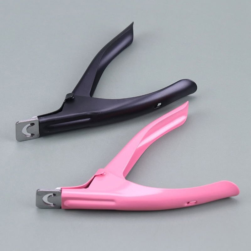 Eco-friendly stapler, black and pink color, durable plastic material, ideal for office and home use, sleek compact design, easy to operate, strong staple holding capacity, portable and lightweight.