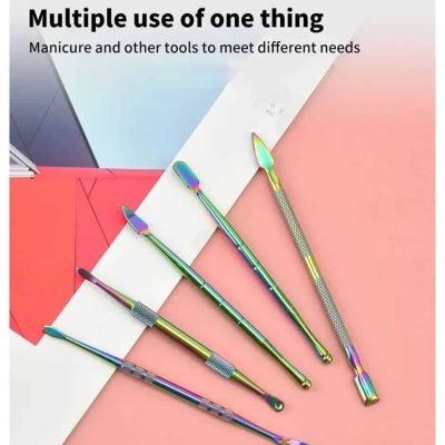 Vibrant, rainbow-colored manicure and beauty tools displayed on pink and white backgrounds, ideal for nail art, manicures, and beauty salons.