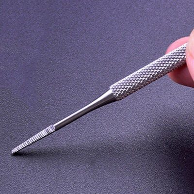 Close-up of a high-precision micro-dermal needle used for beauty treatments, dermal procedures, or skincare in a professional medical setting, highlighting its detailed craftsmanship.