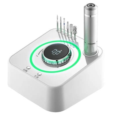 High-tech dental ultrasonic scaler with digital control and multiple tips for professional dental cleaning and periodontal therapy.