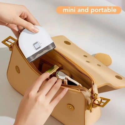 Compact UV sterilizer for purse, handbag, and travel, designed for quick sanitation of accessories and essentials. Easy to carry and convenient for on-the-go disinfection.