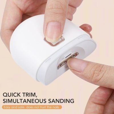 A compact, white nail care device designed for quick and safe nail trimming and sanding, ideal for professional and personal manicures, ensuring gentle and precise grooming without nail damage.