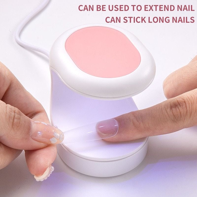 Portable UV LED nail curing lamp for long-lasting gel nails.