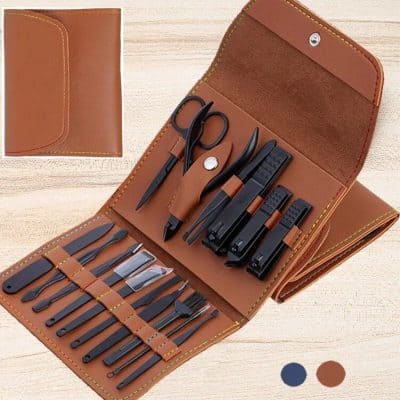 High-quality leather travel manicure kit with scissors, nail clippers, tweezers, and more for professional grooming. Compact, portable, ideal for travel and personal care.