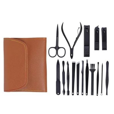 Multiple manicure and pedicure tools for professional and personal use, including scissors, tweezers, files, and clippers, all stored in a sleek brown leather case.