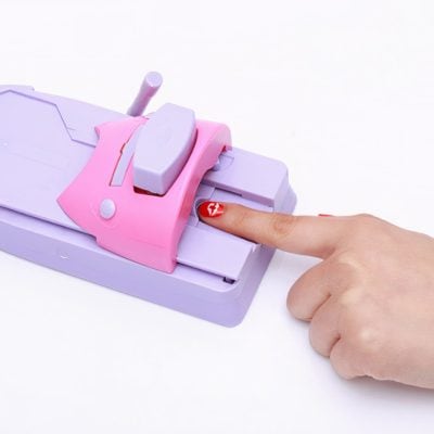 Pink and purple nail polish remover device.