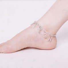 Sparkling silver 'Name' foot anklet jewelry with rhinestones, perfect for personalized accessorizing or special occasions.