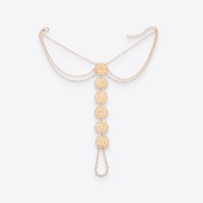 Beautiful gold jewelry necklace featuring floral motifs and a dangling pendant, perfect for women's accessories, weddings, and special occasions.