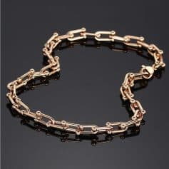 Close-up of a luxurious rose gold chain bracelet with intricate link design, showcasing high-quality craftsmanship perfect for upscale fashion and accessories.