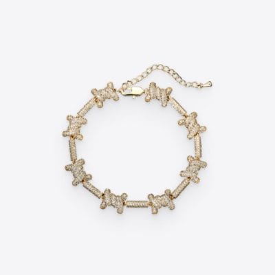 Elegant teddy bear bracelet with sparkling crystals, perfect for fashion accessories and jewelry lovers, available at Monalisa Medical Store.