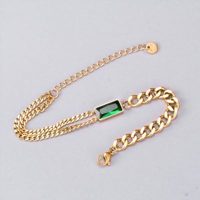 Luxurious gold chain bracelet featuring a rectangular green gemstone and adjustable extension, perfect for stylish accessories and jewelry lovers.