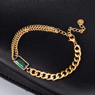 Stylish gold chain bracelet featuring a striking rectangular green gemstone accent, perfect for enhancing your fashion and complementing your accessories collection.