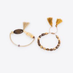 Handmade boho style beaded bracelets with natural wood and tassel accents, perfect for stylish accessories.