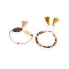 Elegant handmade bracelets for eye health, featuring natural wood beads and tassels, available at Monalisa Store for stylish eyewear accessories.
