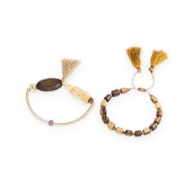 Elegant handmade bracelets for eye health, featuring natural wood beads and tassels, available at Monalisa Store for stylish eyewear accessories.