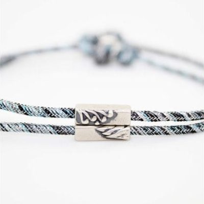 A stylish, high-quality braided eyeglass chain with silver accents, designed to keep your glasses secure and easily accessible. Perfect for eye care and eyewear fashion.