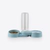 Alt text: Modern pet water dispenser with a light blue base, a water bottle, and a food bowl filled with dry kibble, ideal for pet hydration and feeding.
