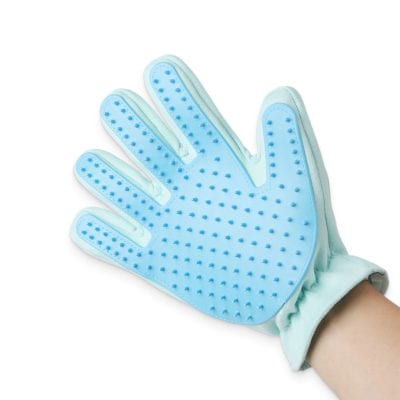 Silicone pet grooming glove with soft bristles for shedding and cleaning.