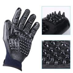 Black textured therapeutic gloves with multiple massage nodes for hand therapy, skin exfoliation, and relaxation.