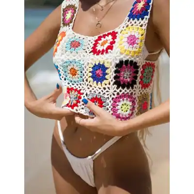 Brightly colored crochet tank top with floral granny squares, perfect for beach and summer outings, handcrafted boho-chic fashion, stylish crochet apparel, women’s summer clothing from Monalisa Store.