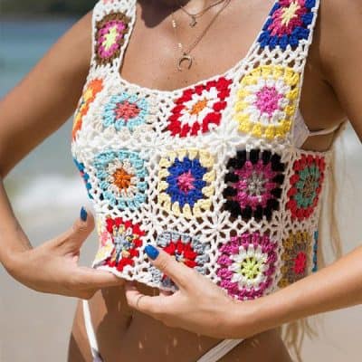 An elegant crochet sleeveless top with colorful granny squares perfect for beach or casual wear from Monalisa Store.