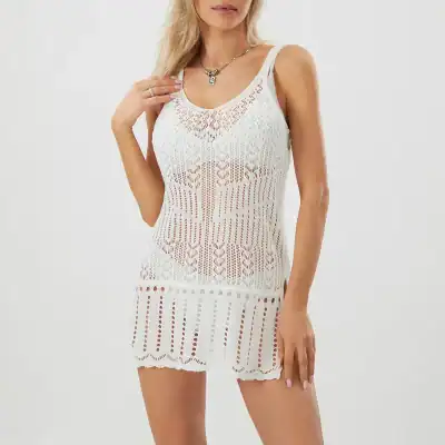 Stylish white crochet dress perfect for summer, beachwear, or casual outings, featuring intricate lace detailing and a comfortable fit.