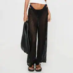 Crochet beach cover-up with open weave design, perfect for summer and beachwear, offering a trendy and breathable style for women’s resort fashion.