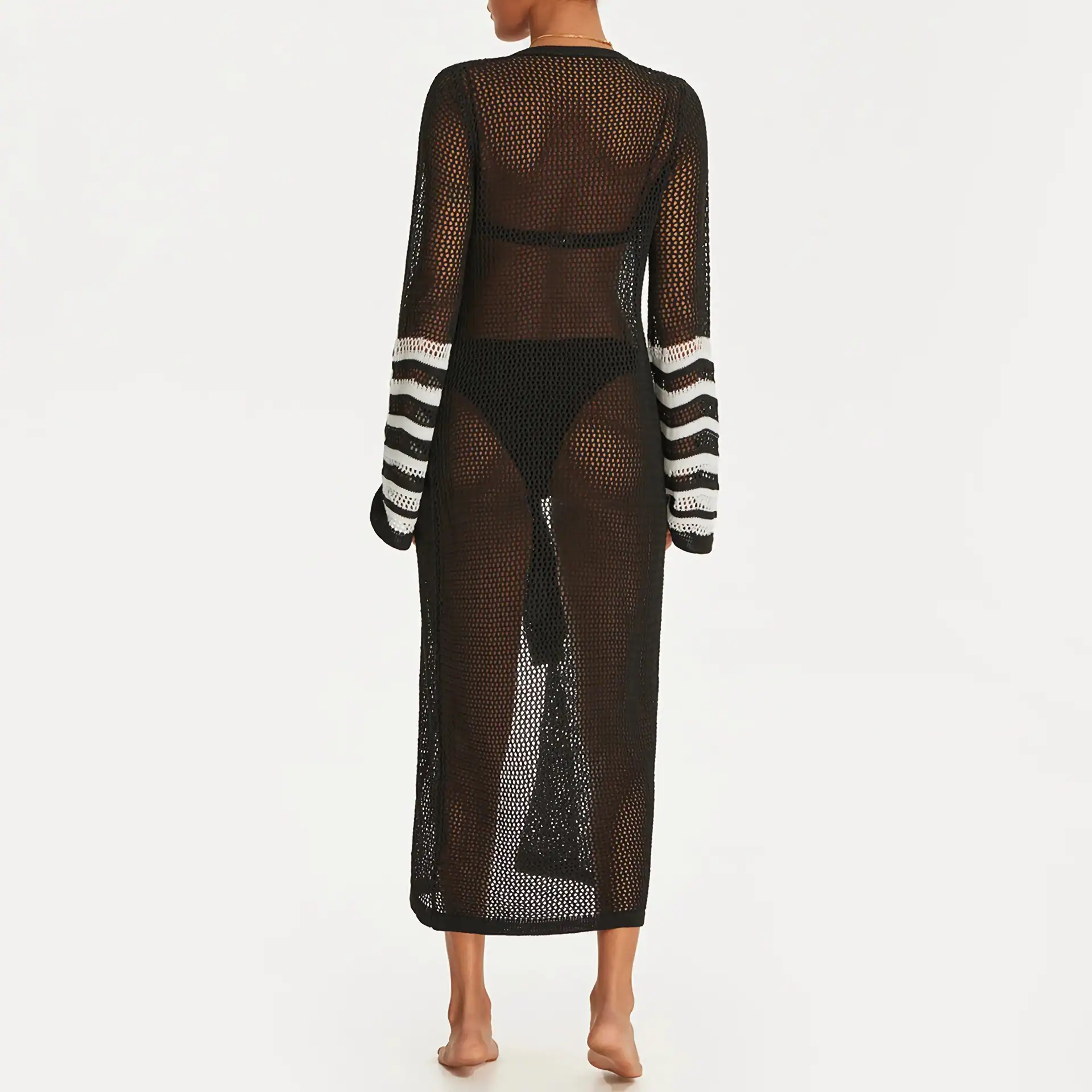 Stylish black crochet beach cover-up with white striped cuffs, perfect for swimwear and beach outings. Lightweight, breathable, and fashionable for summer vacations.