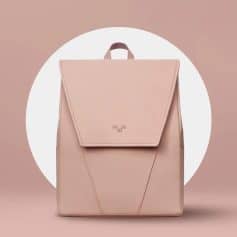 Fashionable pink backpack with sleek design, perfect for daily use and travel, featuring durable materials and functional compartments. Ideal for shopping, work, or casual outings.