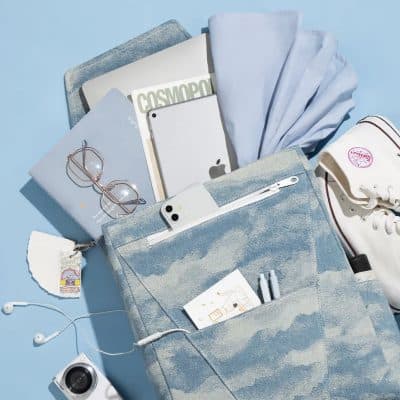Comfortable casual accessories and tech gadgets in a flat lay arrangement.