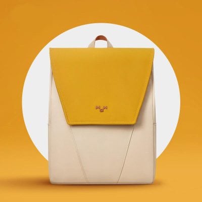 Bright yellow and cream fashion backpack for women, perfect for daily use and travel with durable design.