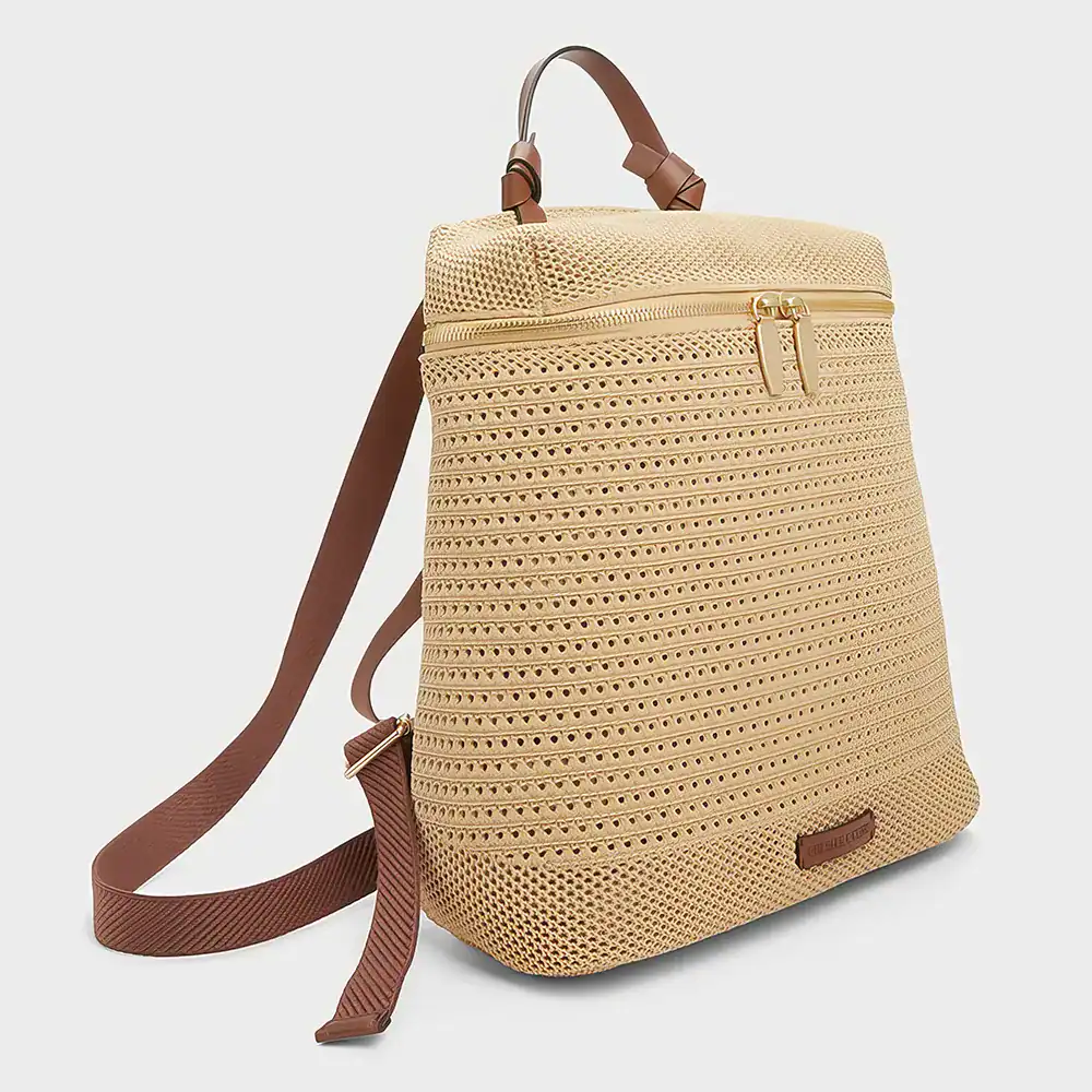 Stylish beige woven backpack with brown adjustable straps, ideal for travel and casual outings, featuring a spacious design and secure zipper closure.