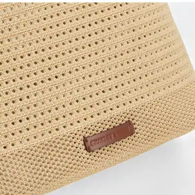 Breathable mesh eyelet storage bag ideal for storing glasses, lenses, and ophthalmic supplies, featuring a durable design and breathable holes for ventilation, perfect for eye care professionals and patients.