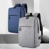 Alternative text: Modern backpacks in blue and gray with multiple compartments, ideal for travel and daily use. Perfect for carrying laptops and essentials efficiently.