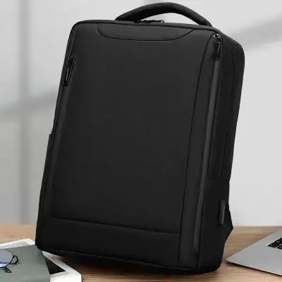 Versatile black laptop backpack ideal for travel and business, featuring multiple compartments, padded laptop sleeve, and durable material for professional and everyday use.