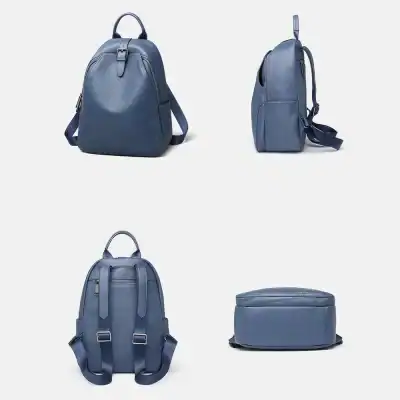 Stylish blue leather backpack with multiple compartments, perfect for travel, work, or casual outings. Durable design suitable for everyday use, blending fashion and functionality seamlessly.