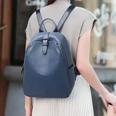 Comfortable stylish leather backpack for women, ideal for travel, work, and everyday use, featuring secure zipper closures and adjustable straps. Perfect for fashion-conscious women.